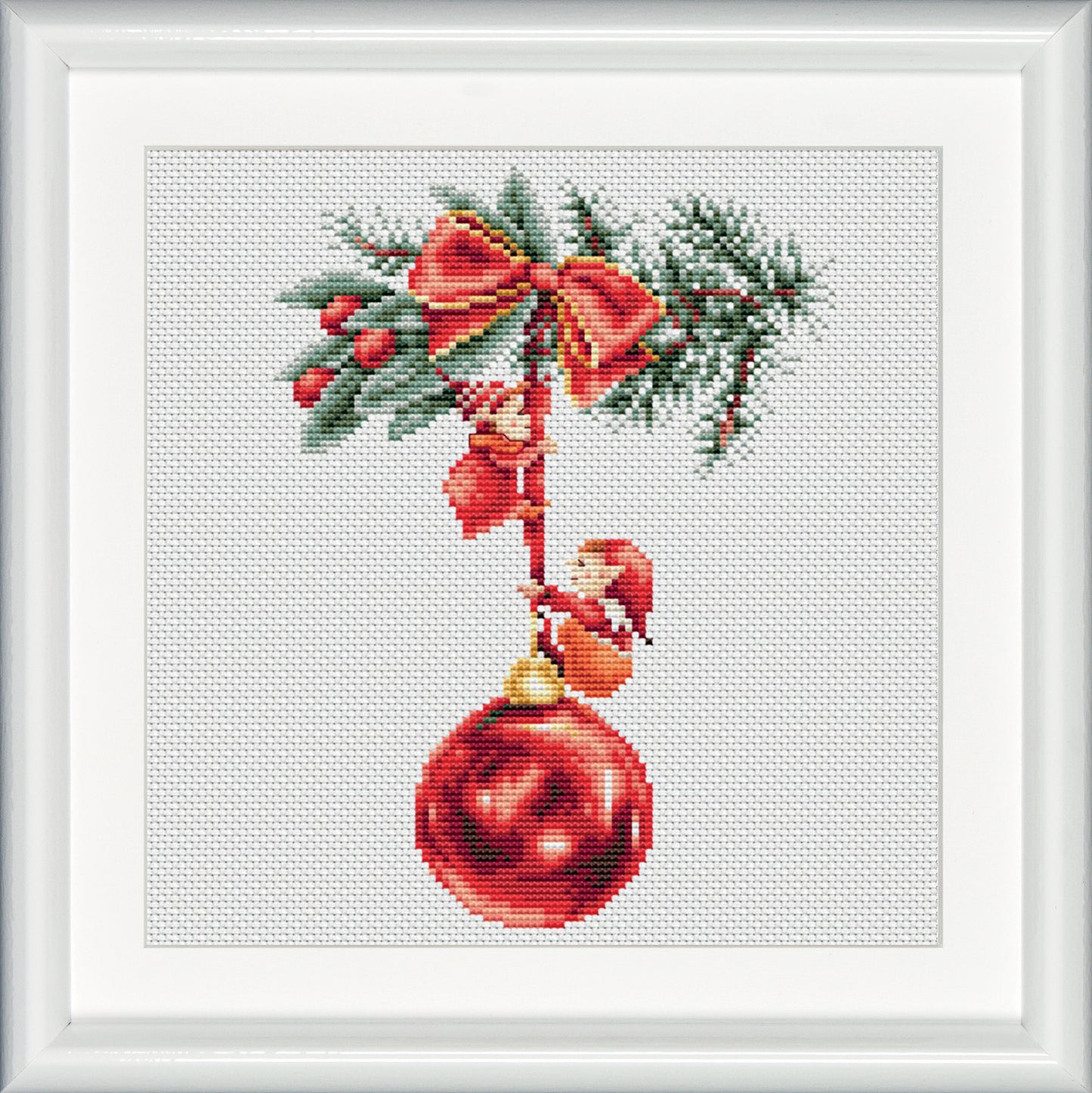 Three lovely embroidery designs of Christmas elves. This second design shows two elves hanging from a bright red christmas ornament. The colors red and green predominate in this design, which gives a true Christmas feeling! DSB cross stitch kits have easy to follow design charts and contain all items needed. 
