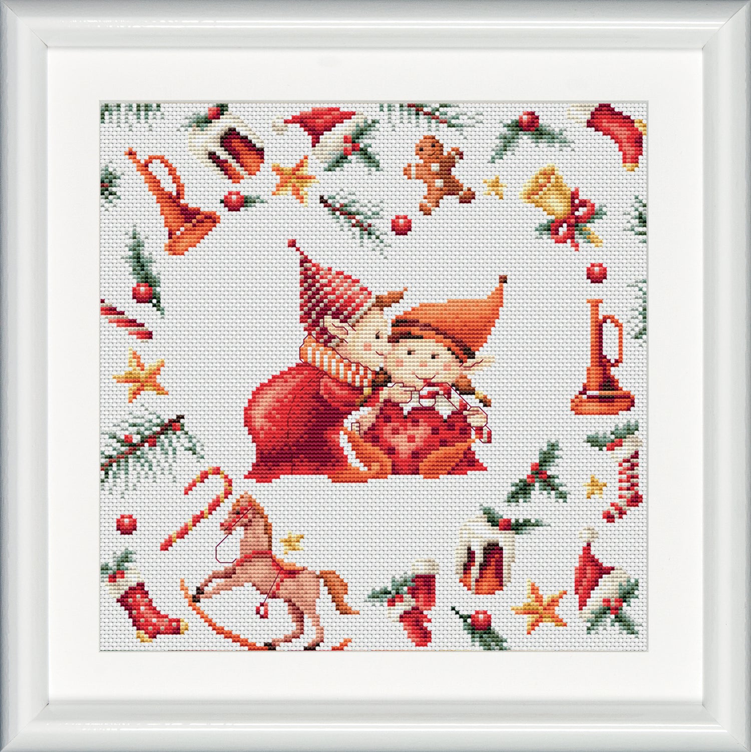 Three lovely embroidery designs of Christmas elves. In this third design you see two elves in love. They are surrounded by Christmas decoration which create the shape of a heart. DSB cross stitch kits have easy to follow design charts and contain all items needed. To cater to both beginners as well as advanced stitching artists.